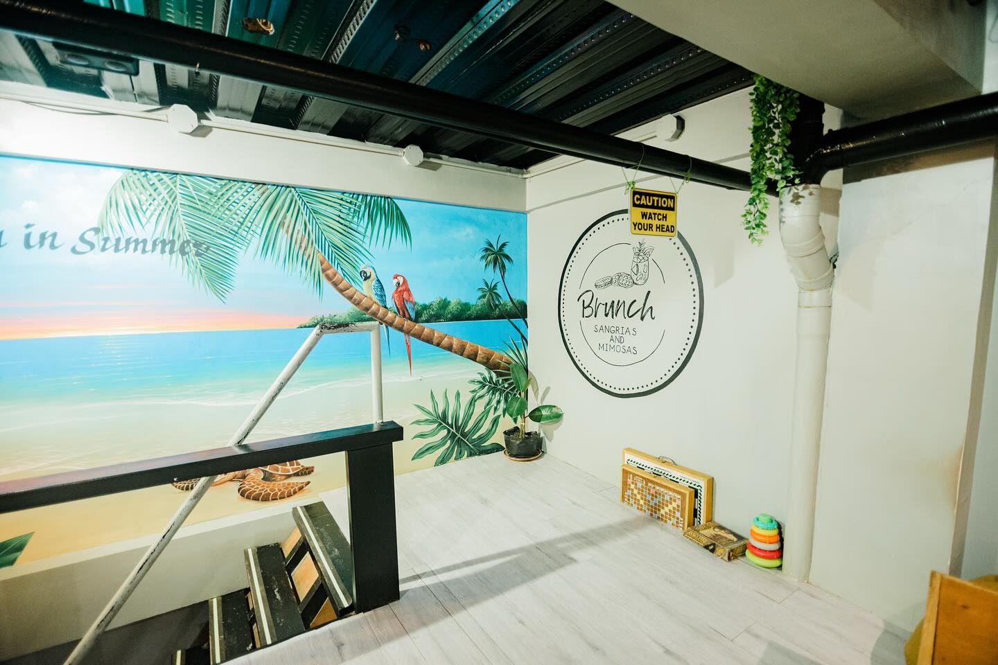 Brunch El Nido interior with tropical mural