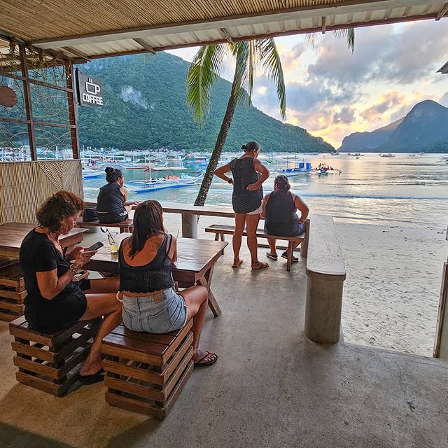 Hama Coffee beachfront terrace at sunset, El Nido Palawan