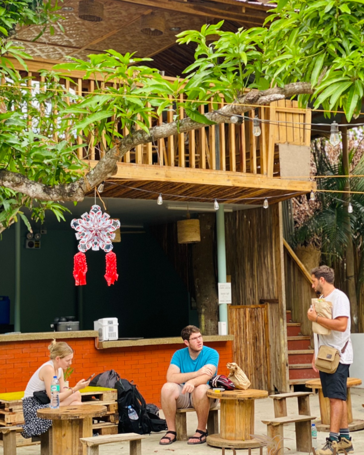 Guests socializing at Pugad Hostel