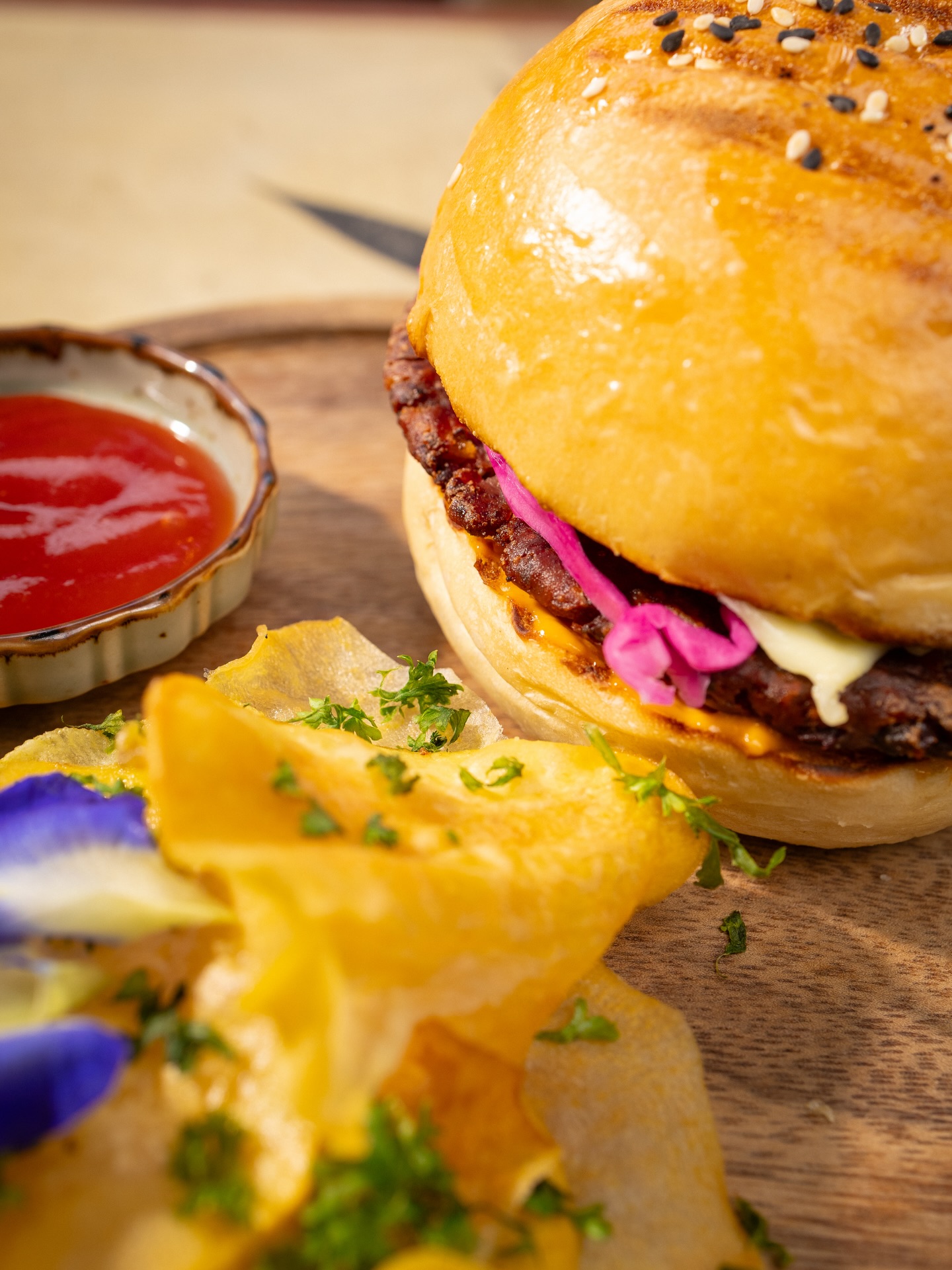 Gourmet burger on a wooden board